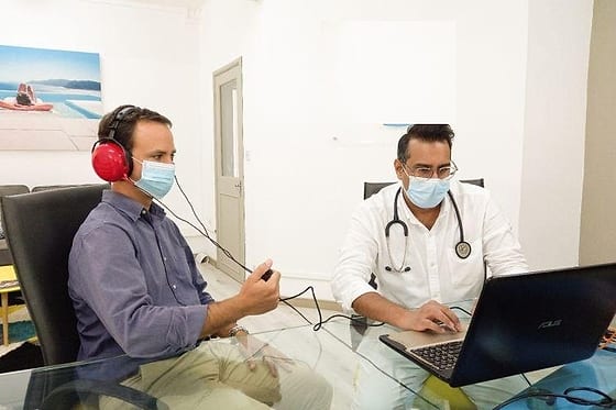 Audiometric hearing test being carried out on an employee